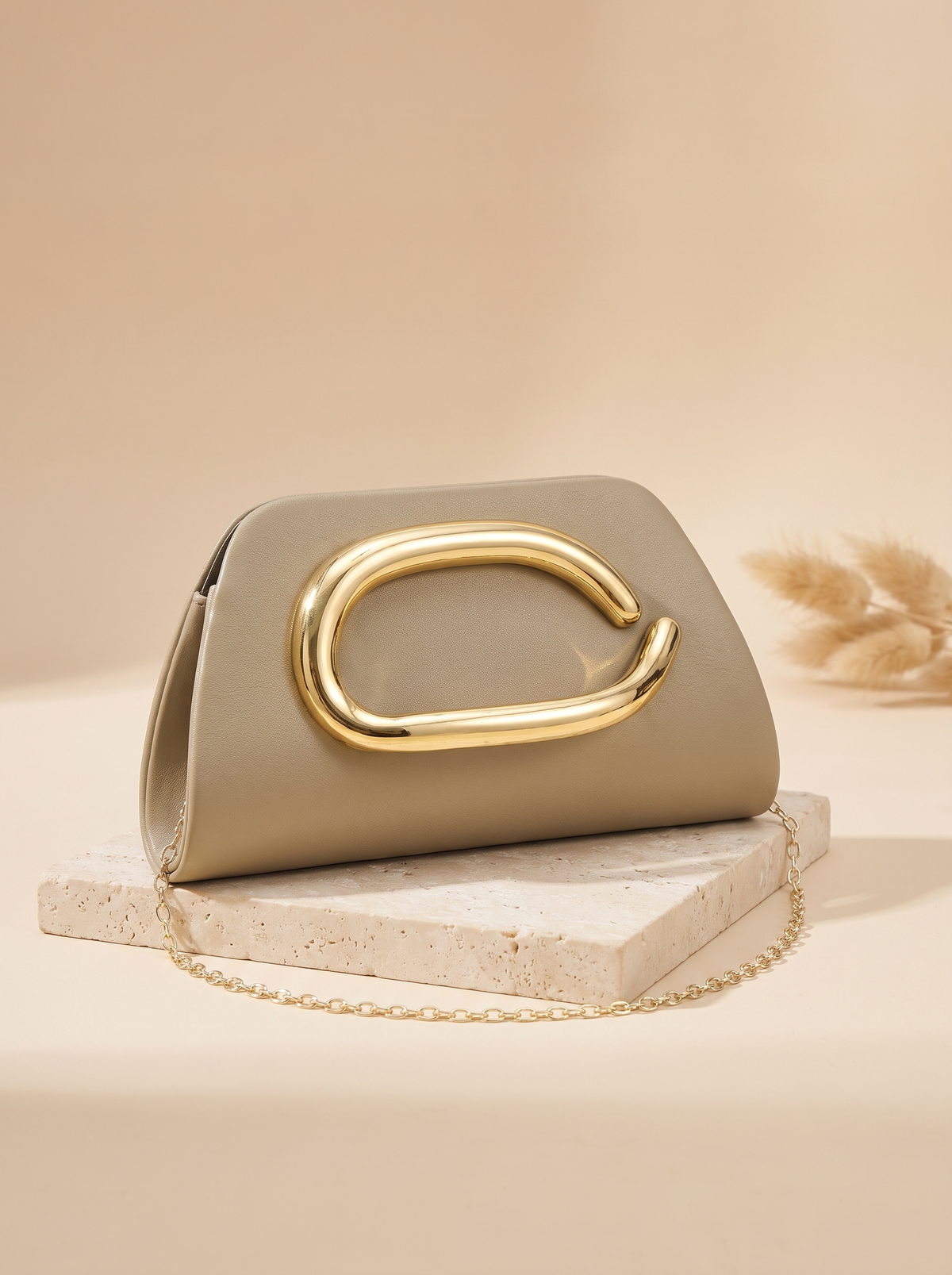 Pochette Éclat à anneau doré – Doré – détail produit