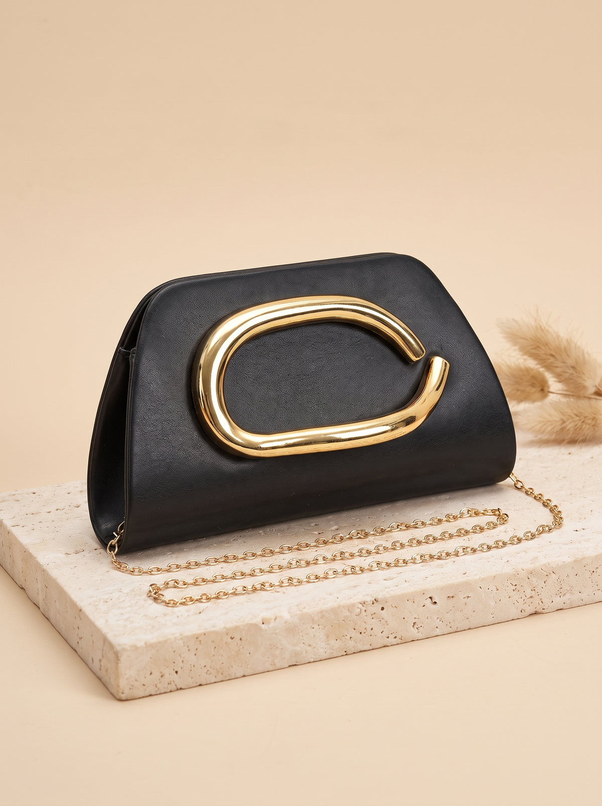 Pochette Éclat à anneau doré – Noir – détail produit